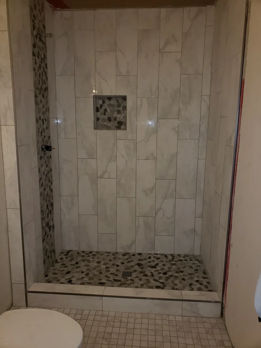 Porcelain + Stone Accent Porcelain Shower with Stone Accent | Albaner Tile and Stone Phoenix